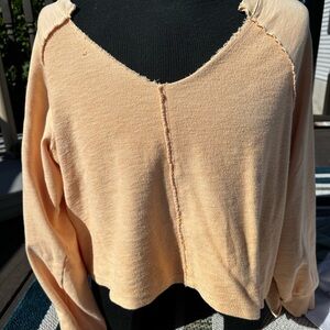 Pastel orange sweater
